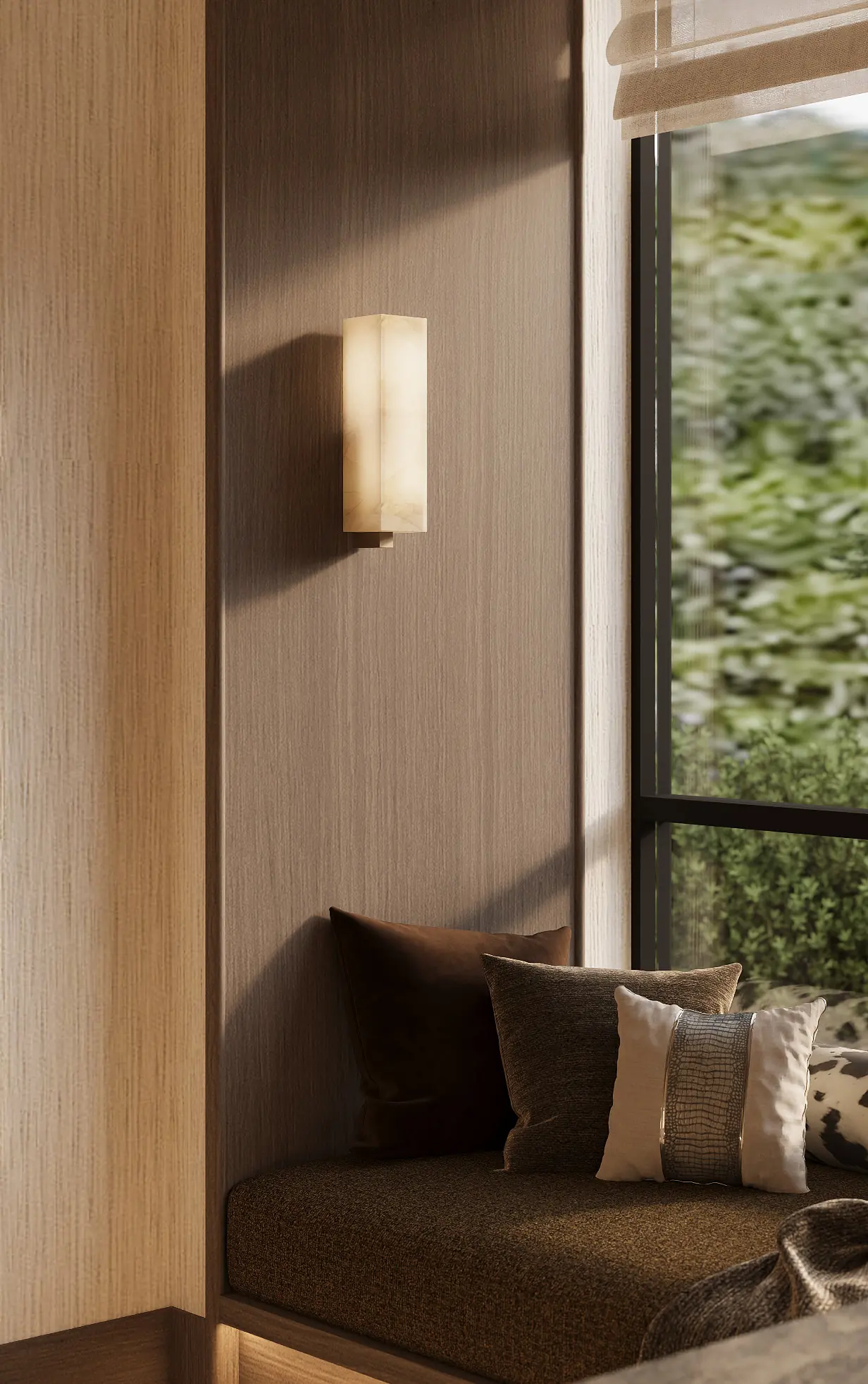 A window seat beside a timber wall with an alabaster sconce